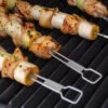 Broil King 4-teiliges Doppelspieß-Set, 30,5 Cm 1 Broil King 4-teiliges Doppelspieß-Set, 30,5 Cm -Santo Grills Geschaft broil king doppelspiess set ad19e32247b8d6ce9b341f38c6249cf3
